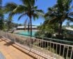 Balcony outlooking pool at Eurong Beach Resort