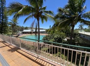 Balcony outlooking pool at Eurong Beach Resort