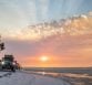 4WD car driving on beach