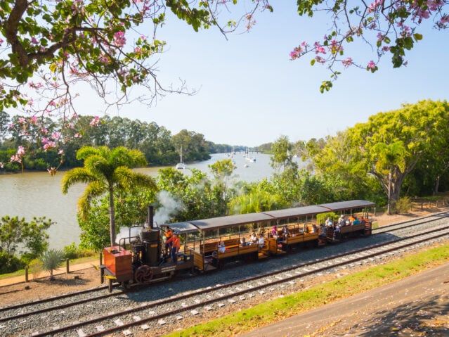 Steam train along the river in Maryborough