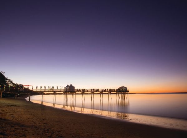 View of Scarness Pier at sunset