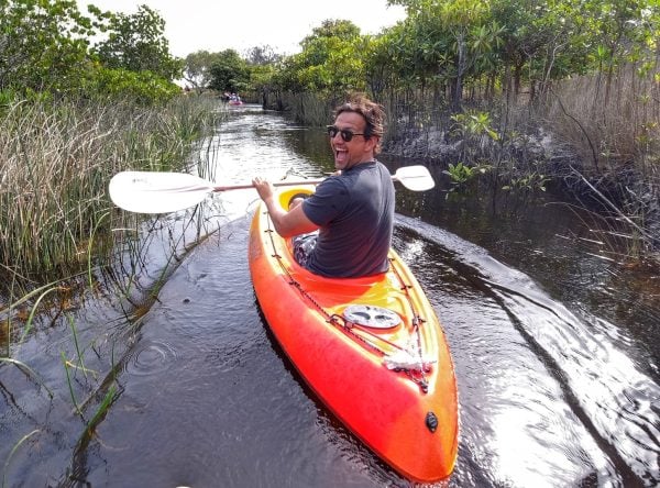 Man kayaking down Awinya Creek