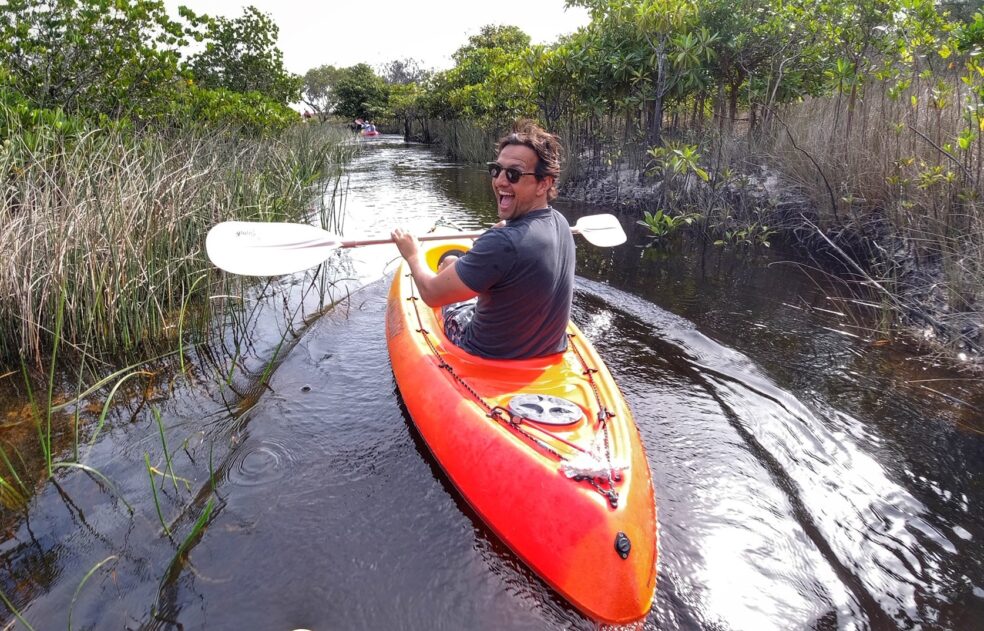 Man kayaking down Awinya Creek