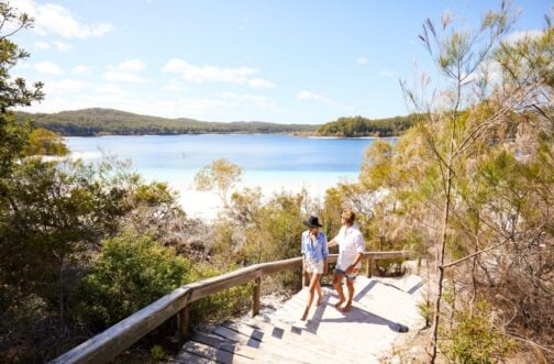 couple walking on hiking trail on k'gari/fraser island