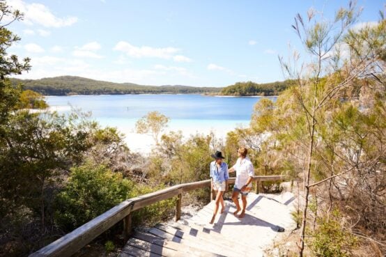 couple walking on hiking trail on k'gari/fraser island